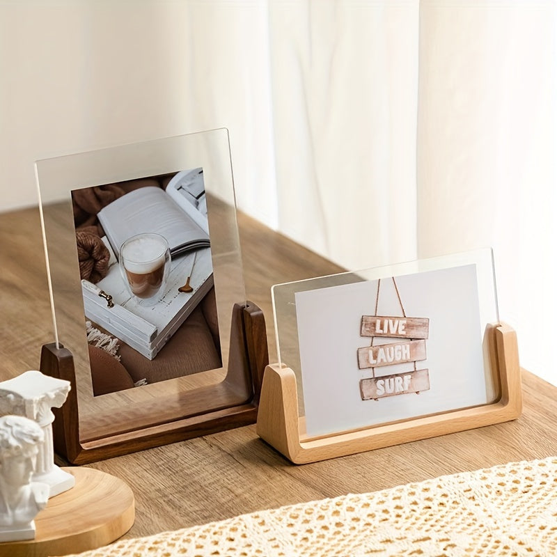 Fana walnut and beech frames, one vertical and one horizontal, on a wooden table