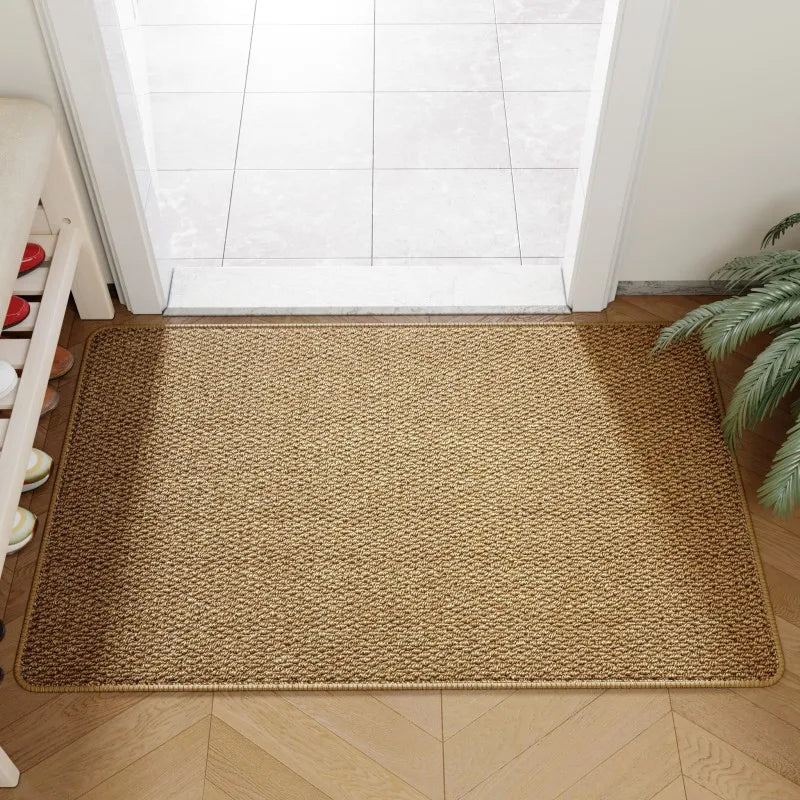 Faux jute door mat in natural inside a front door