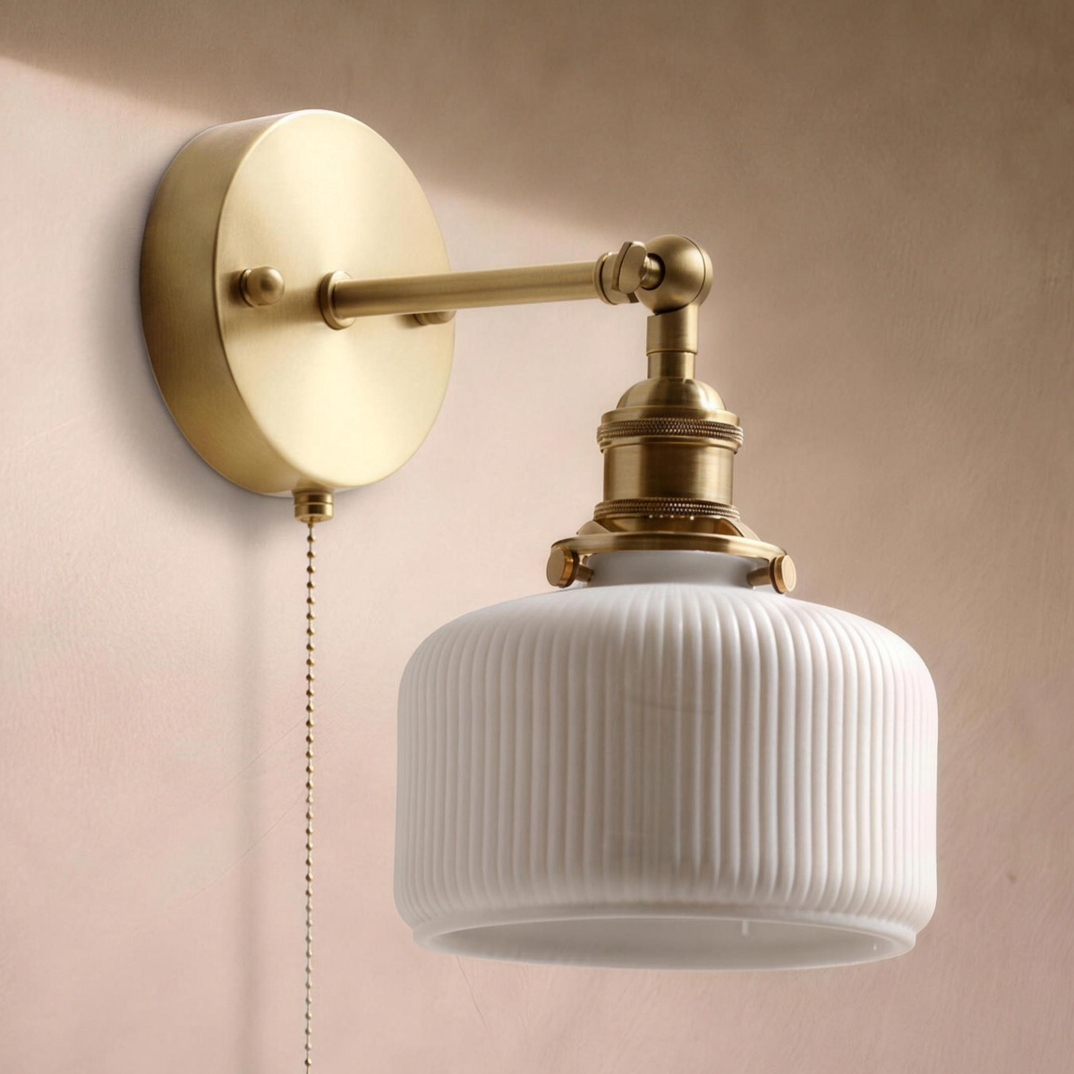Fia wall sconce in Adjustable on a warm plaster wall