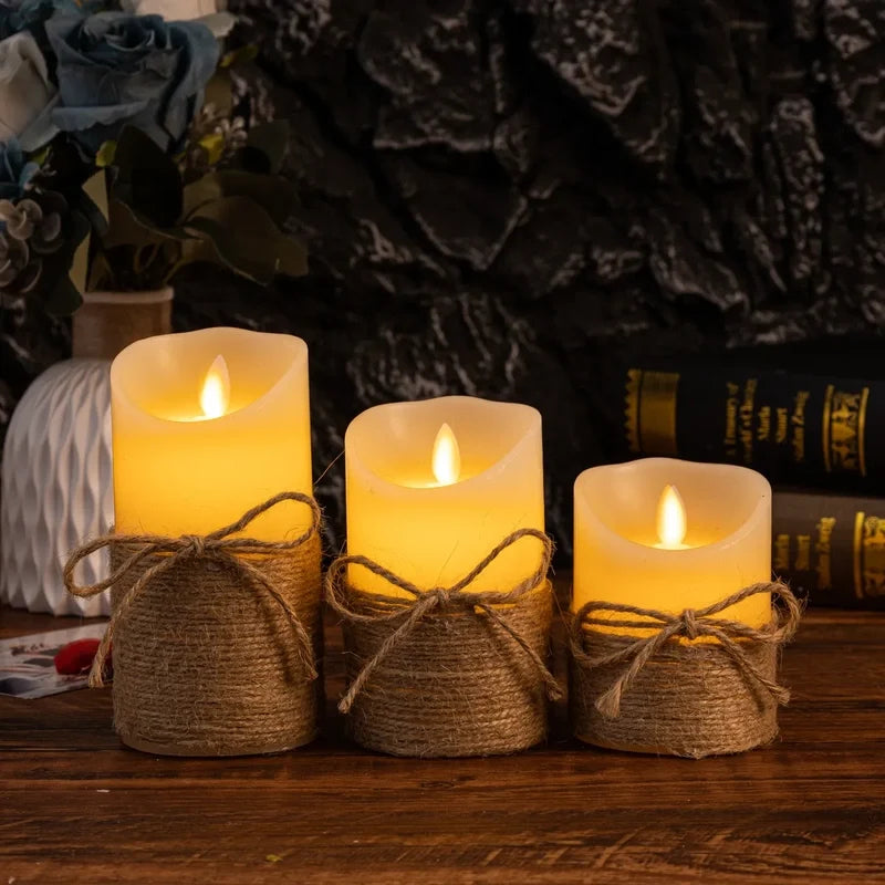 Three rope wrapped flameless candles lit