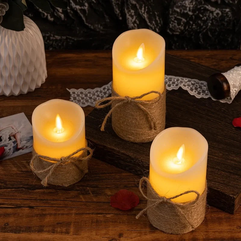 Rope wrapped flameless candles on a wood board