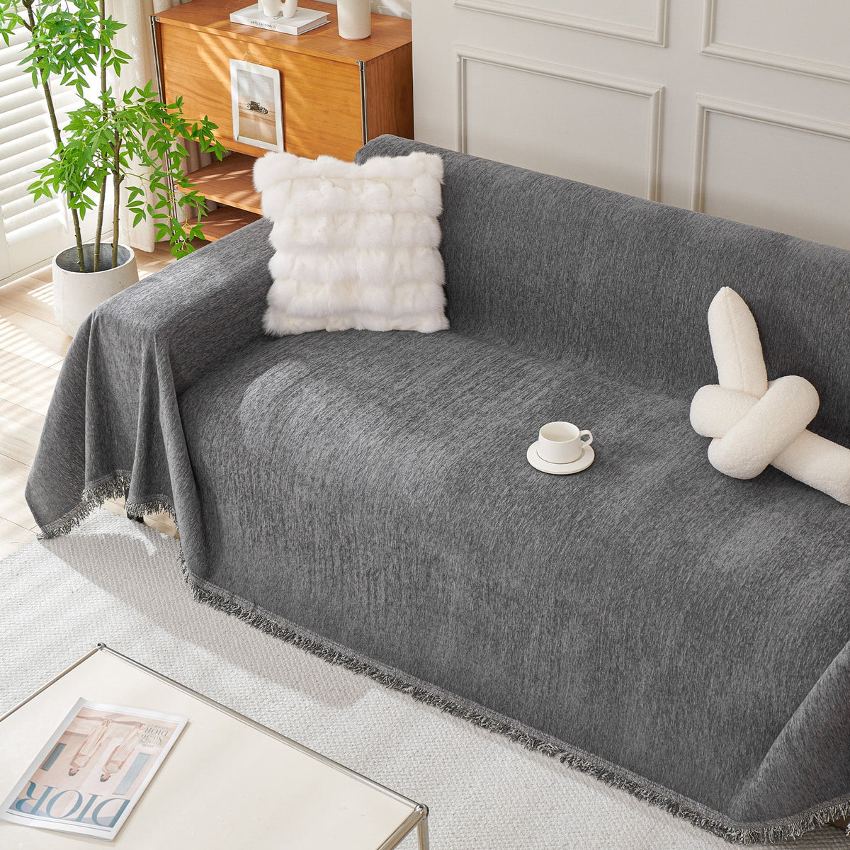 Dark gray woven cover by a coffee table