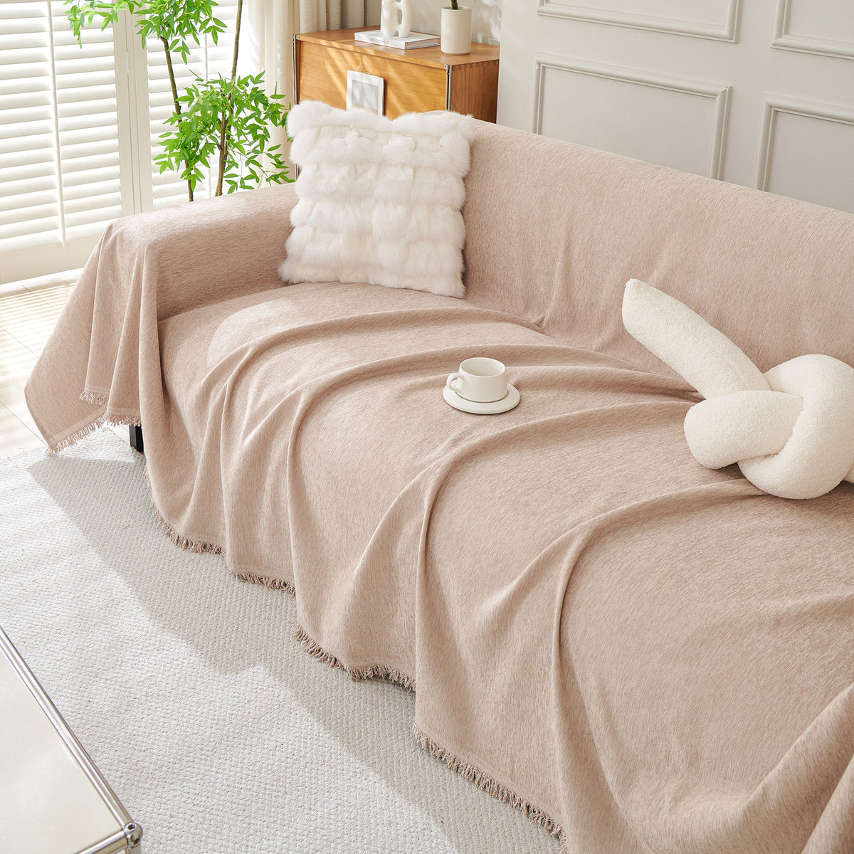 Blush pink woven cover draped in soft folds