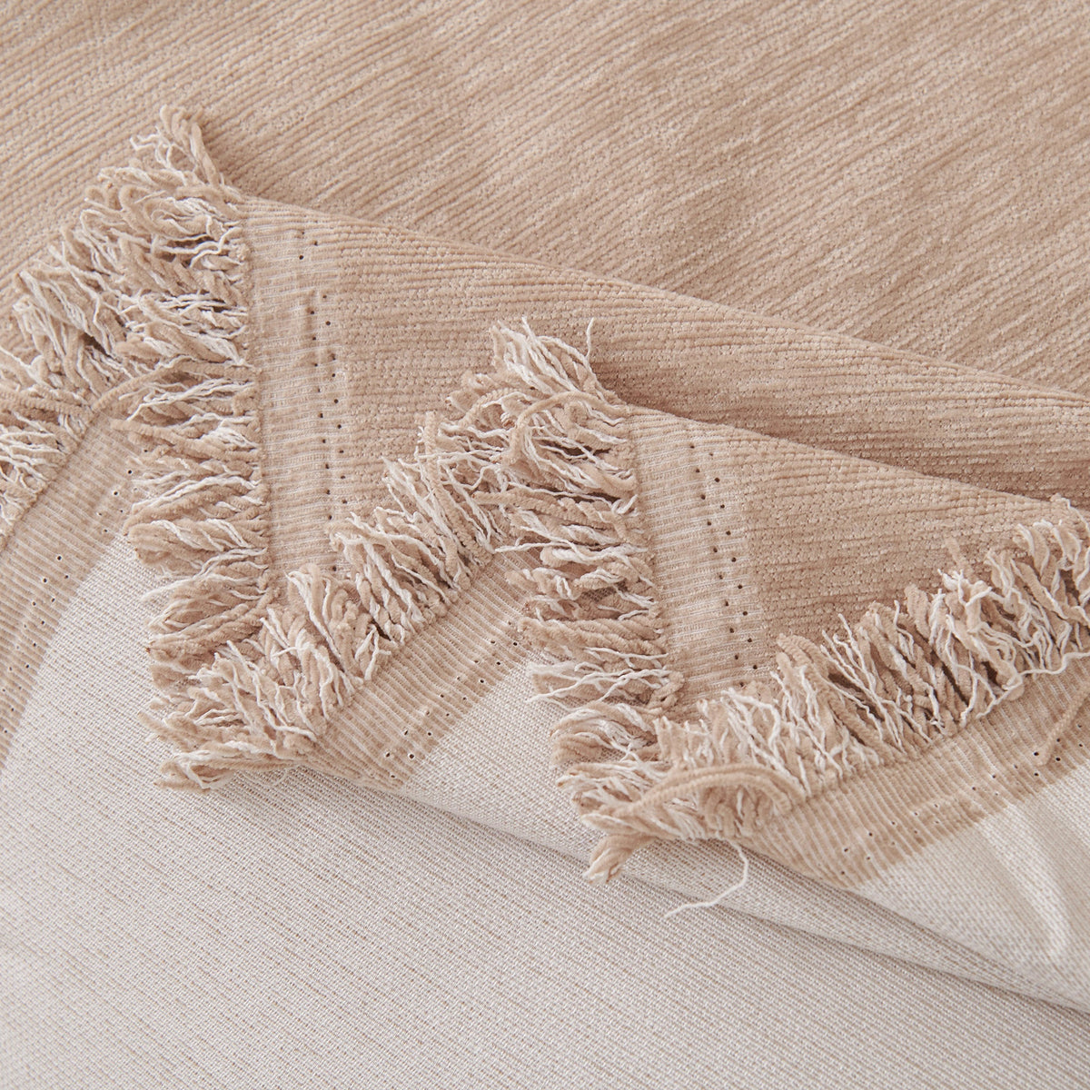 Close view of the blush pink fringed edge