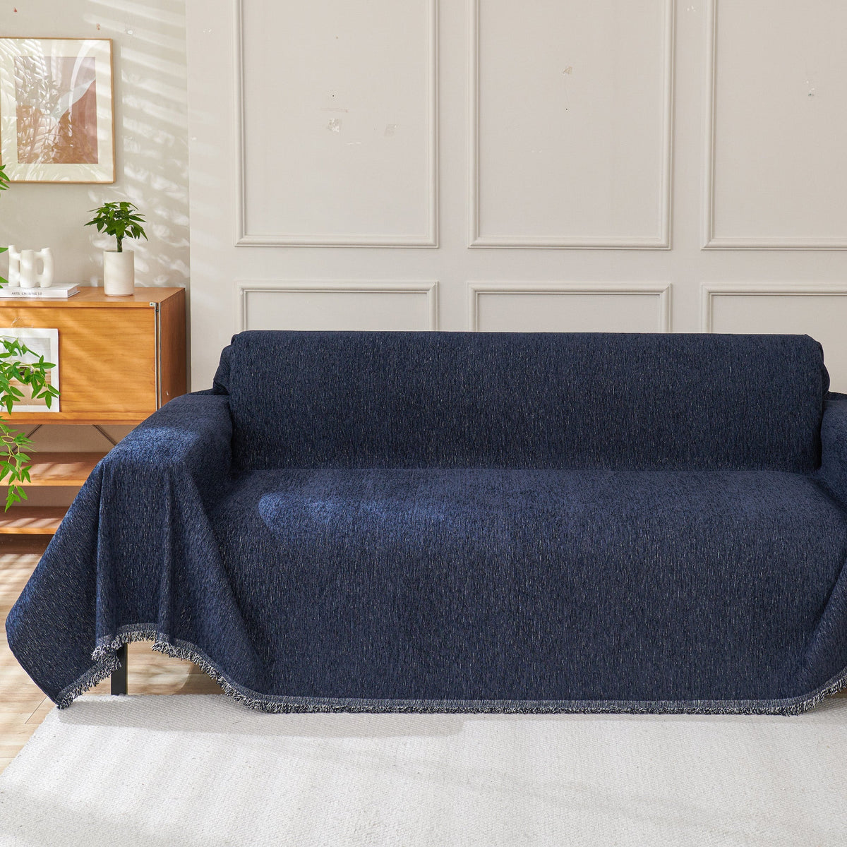 Navy blue woven cover over a sofa