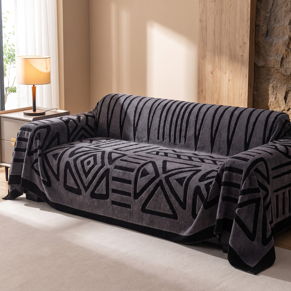 Sofa Cover in Charcoal on a sofa, covers the whole sofa