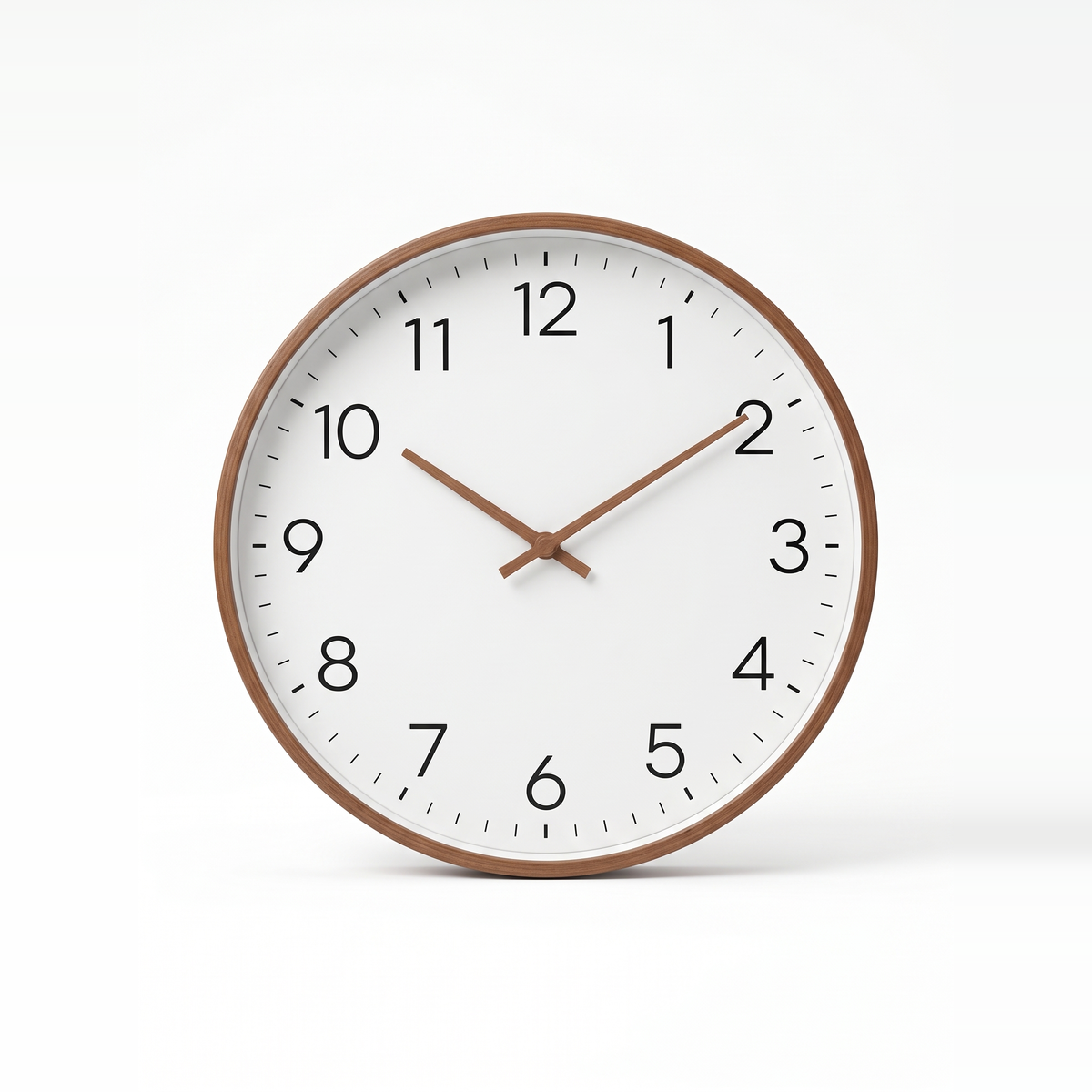 Hamar silent wall clock with brown wood frame and plain white dial, on white