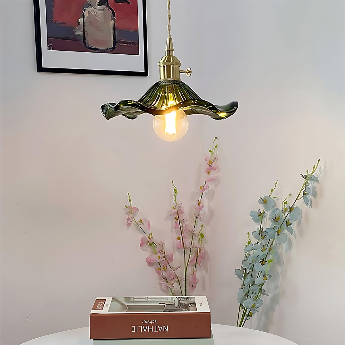 Green Hanne pendant light over a side table