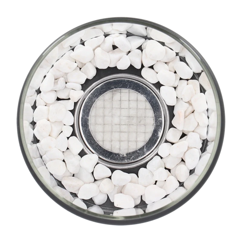 Top view of the burner surrounded by white stones
