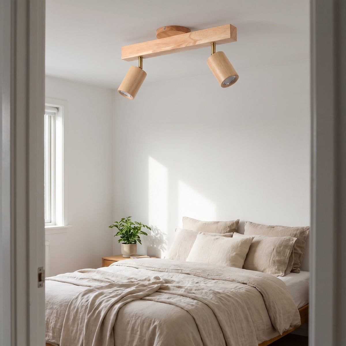 Iida wooden spotlight bar on a bedroom ceiling
