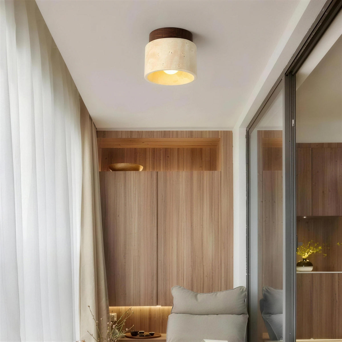 Jonna ceiling light, travertine drum, lighting a narrow balcony nook