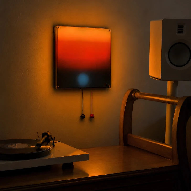 Lyng sunset wall light above a record player