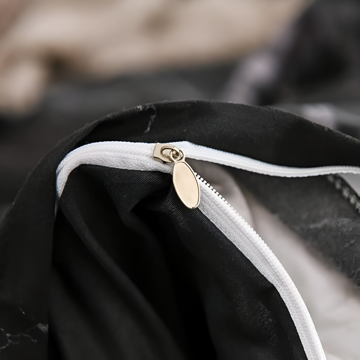 Close view of the zipper on the marble duvet cover