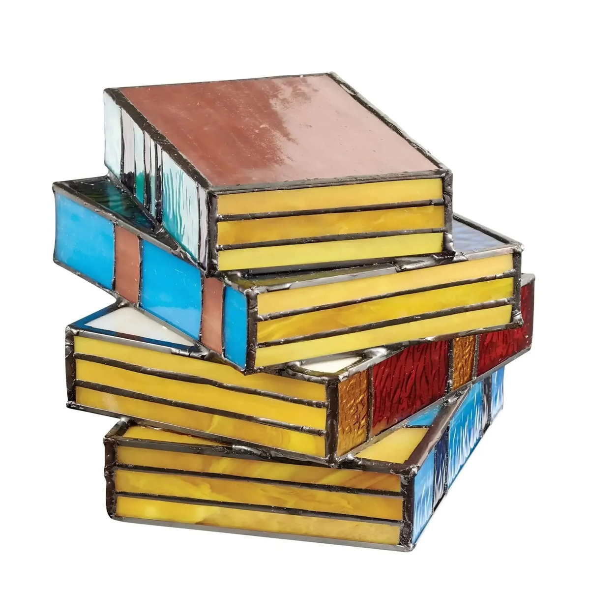 Molde stained glass book stack lamp unlit, seen from above, on white