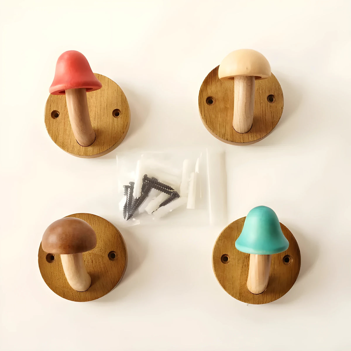 The four mushroom hooks with the screws and anchors that come with them