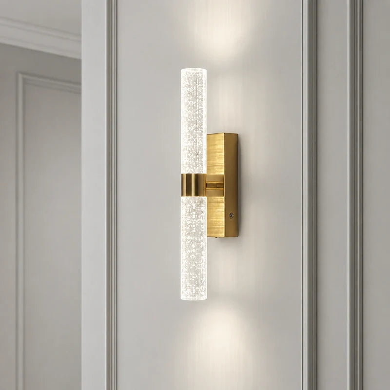 Namsos wall light lit on a white wall