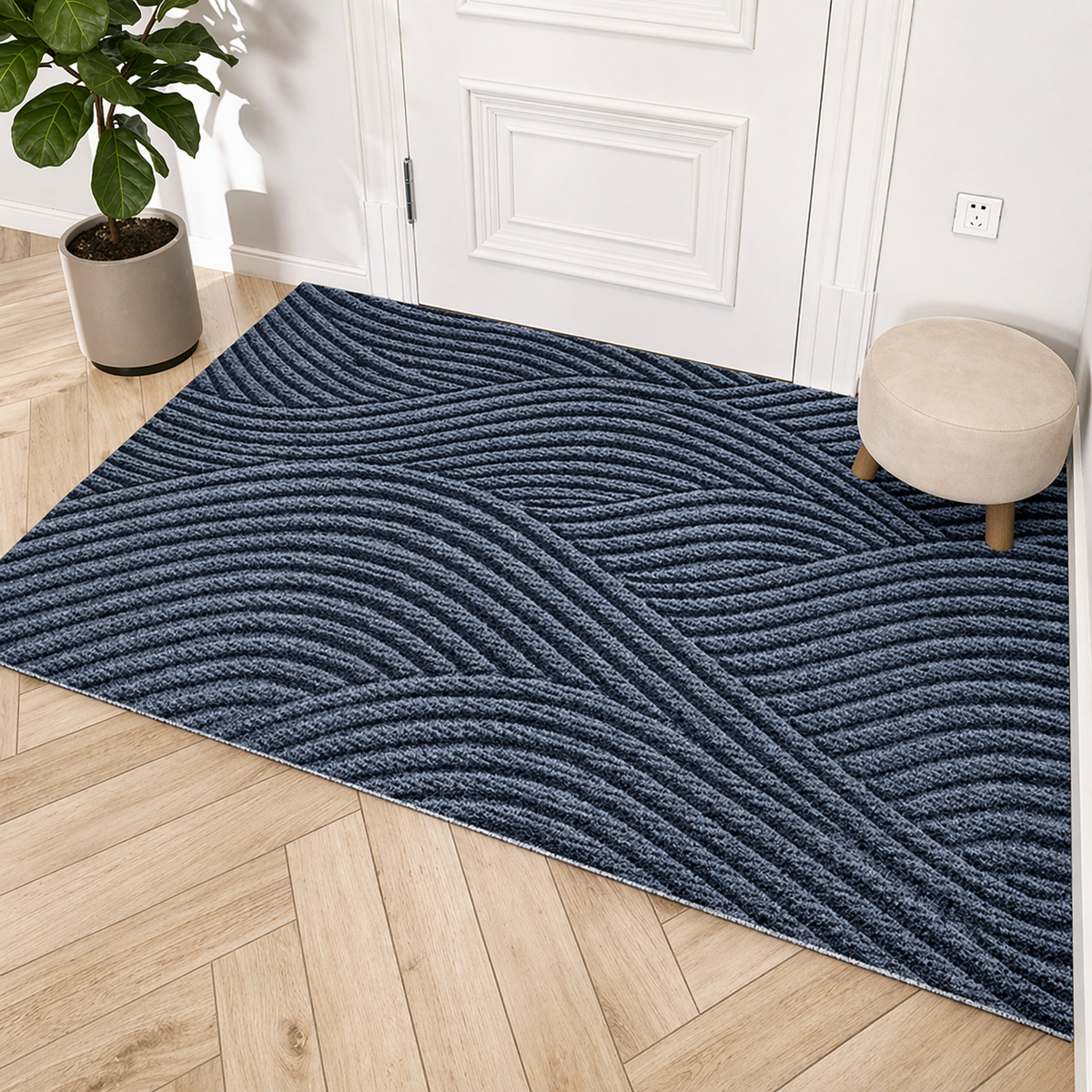 Blue door mat inside a white front door with plants and a stool