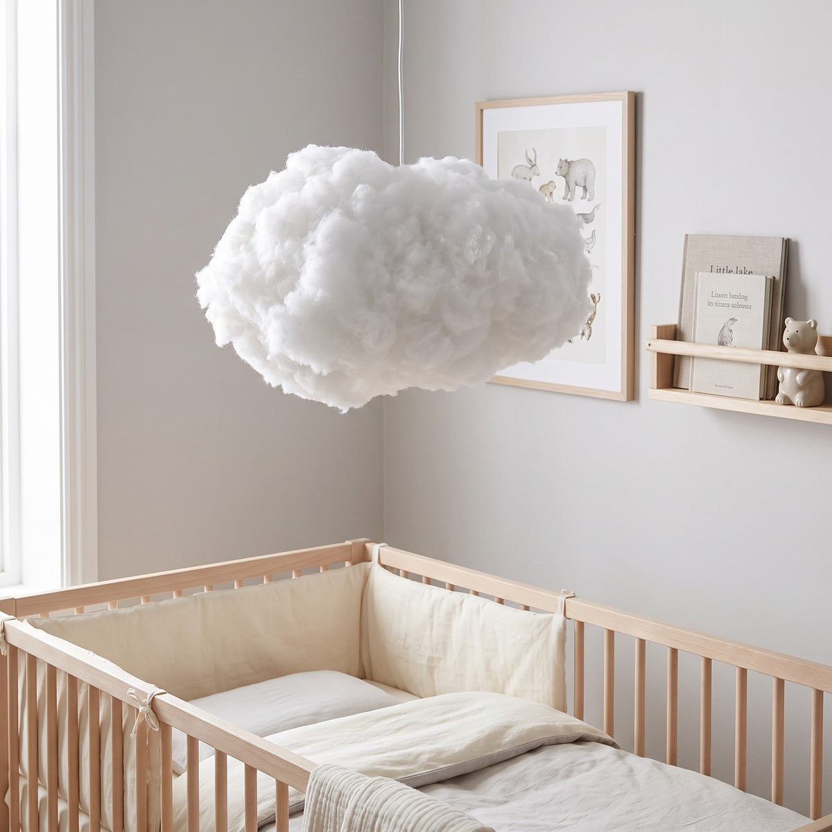 Petra cloud pendant light hanging in a nursery corner