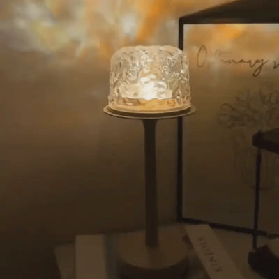 Arvika lamp casting moving northern lights patterns across a wall