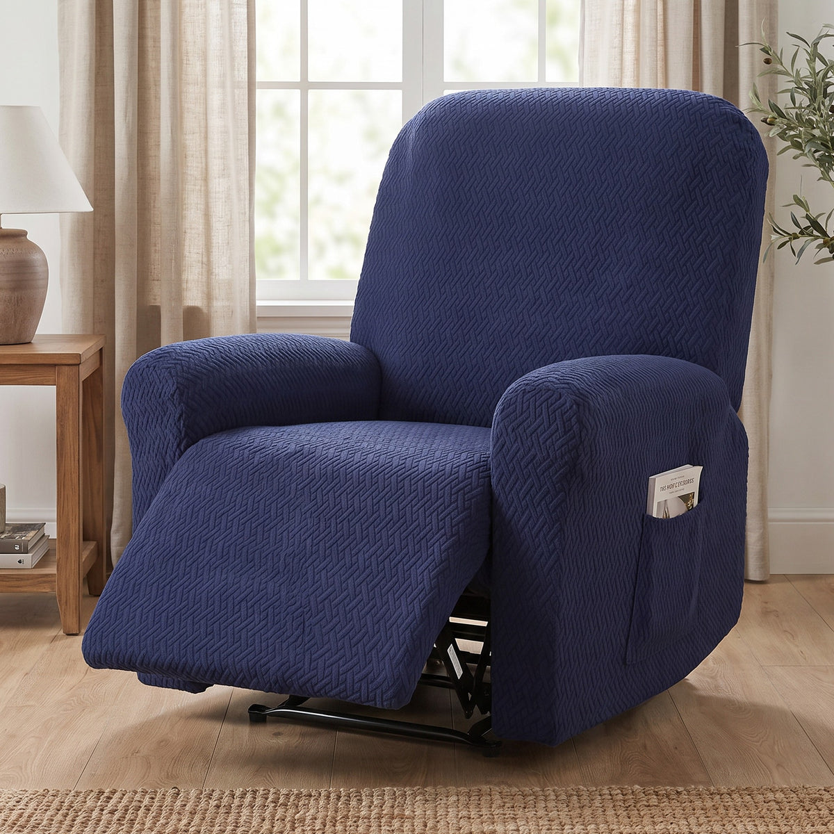 Recliner Chair Cover in Navy on a recliner in a living room