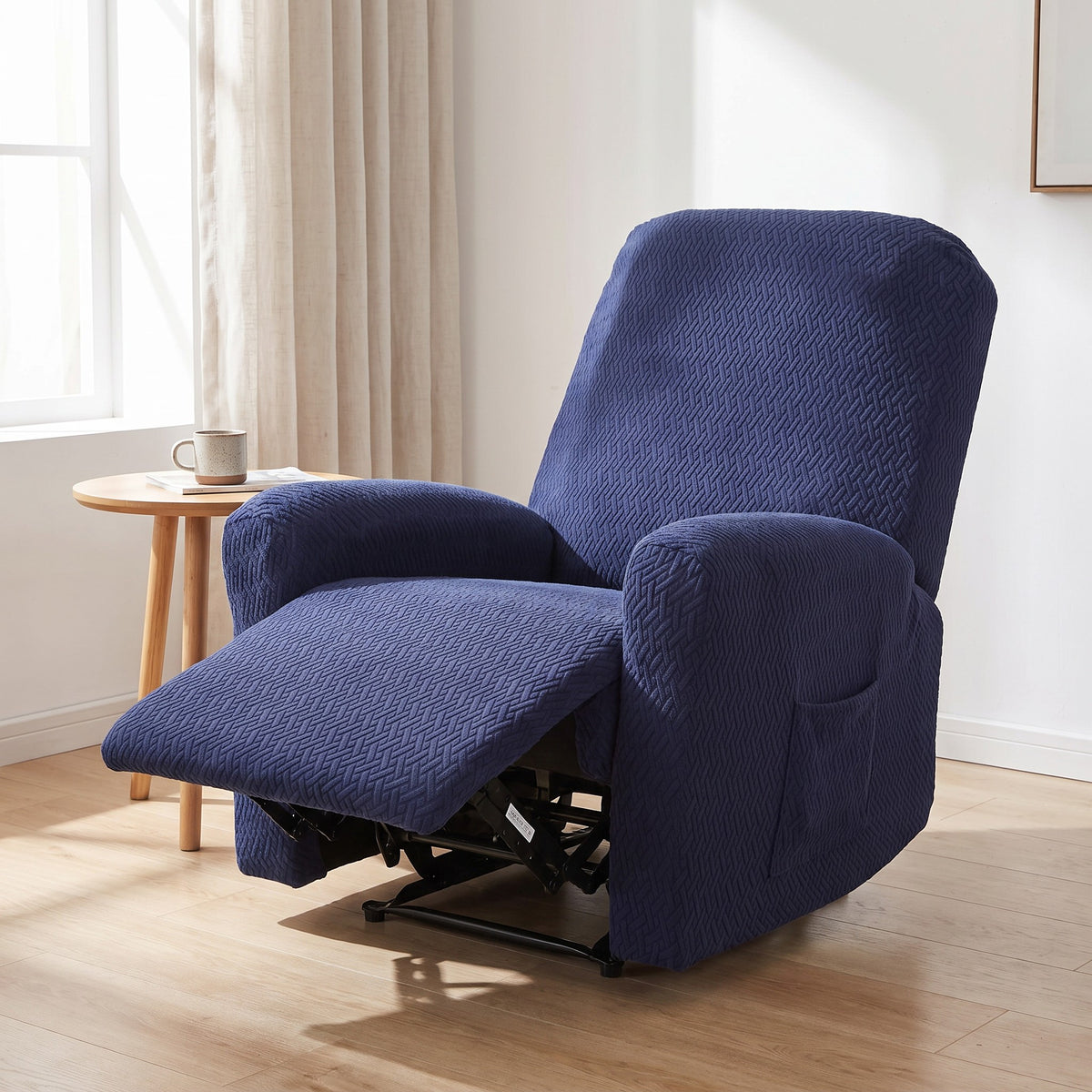 Recliner Chair Cover in Navy on a recliner, four separate fitted pieces