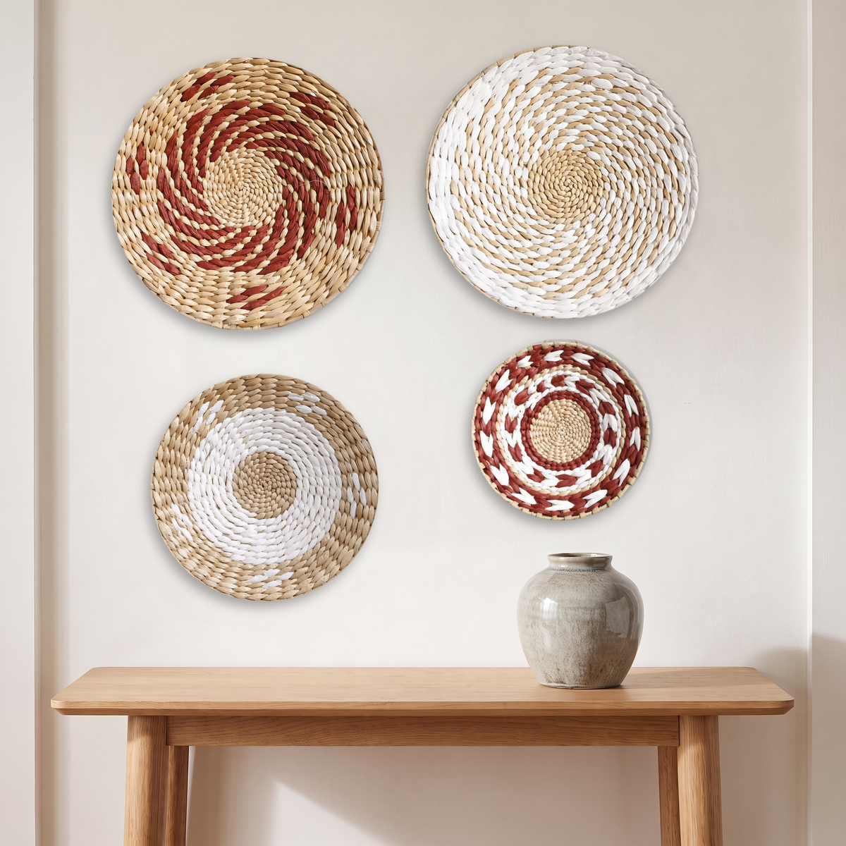 Sanne seagrass wall basket in Set of Four, Mix A on a warm white living room wall above a console