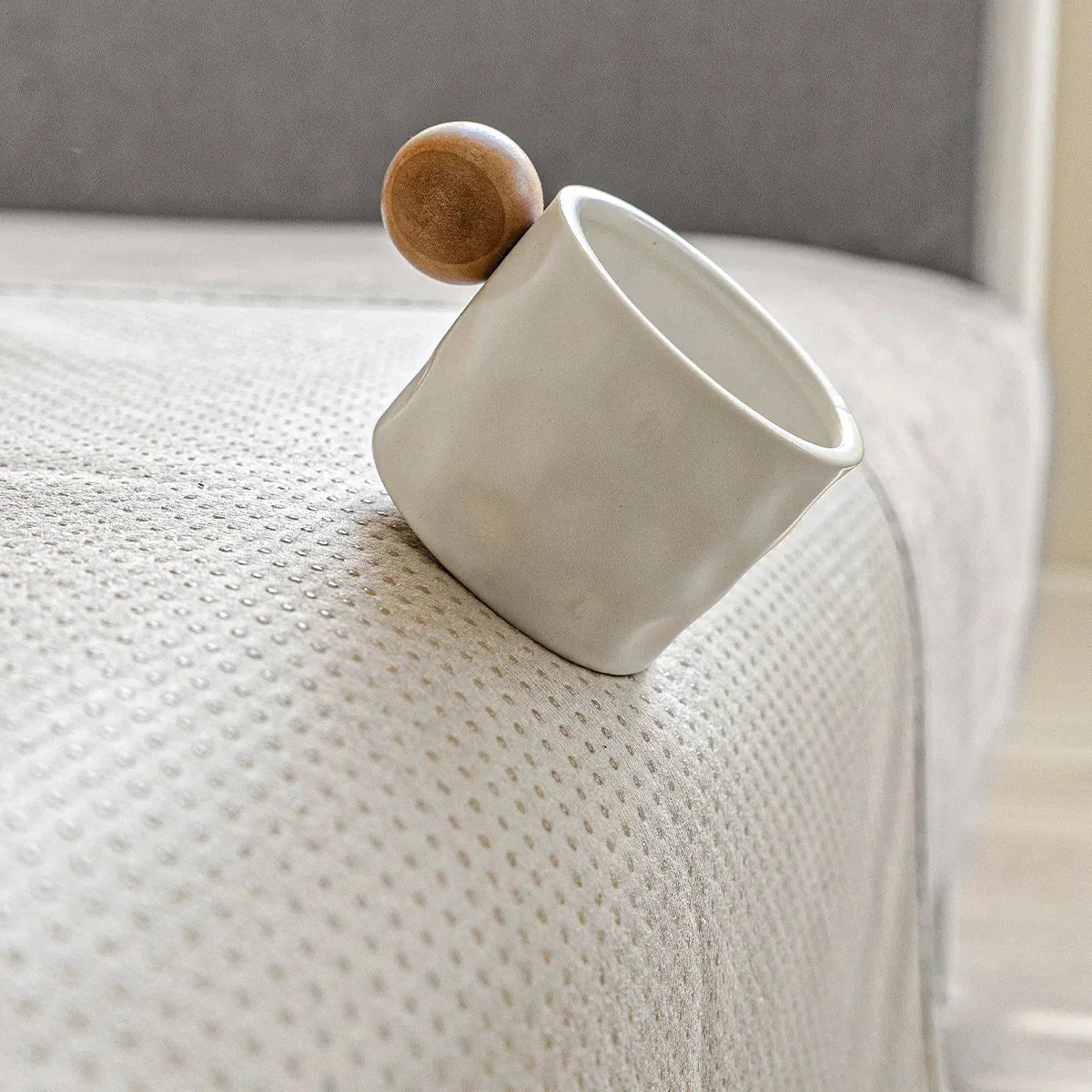 Close view of the dotted backing of the ribbed sofa cover