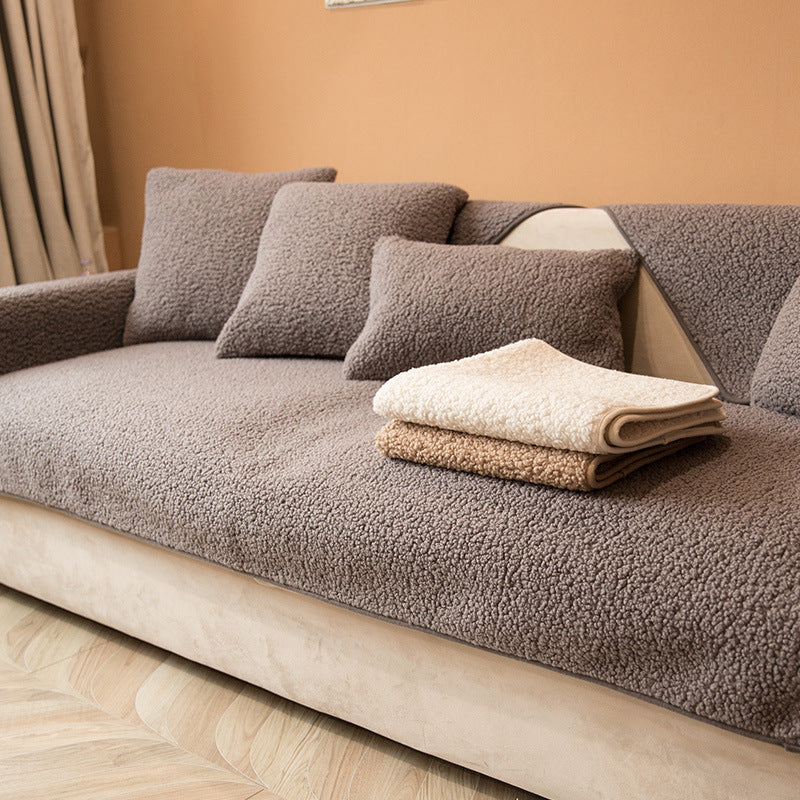 Dark gray sherpa sofa cover with cushions