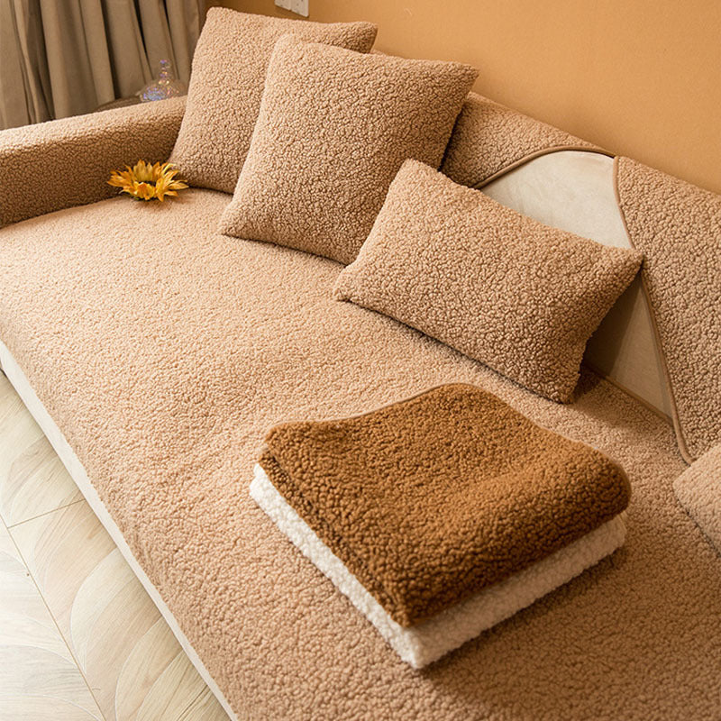 Close view of light brown sherpa cushions and seat cover