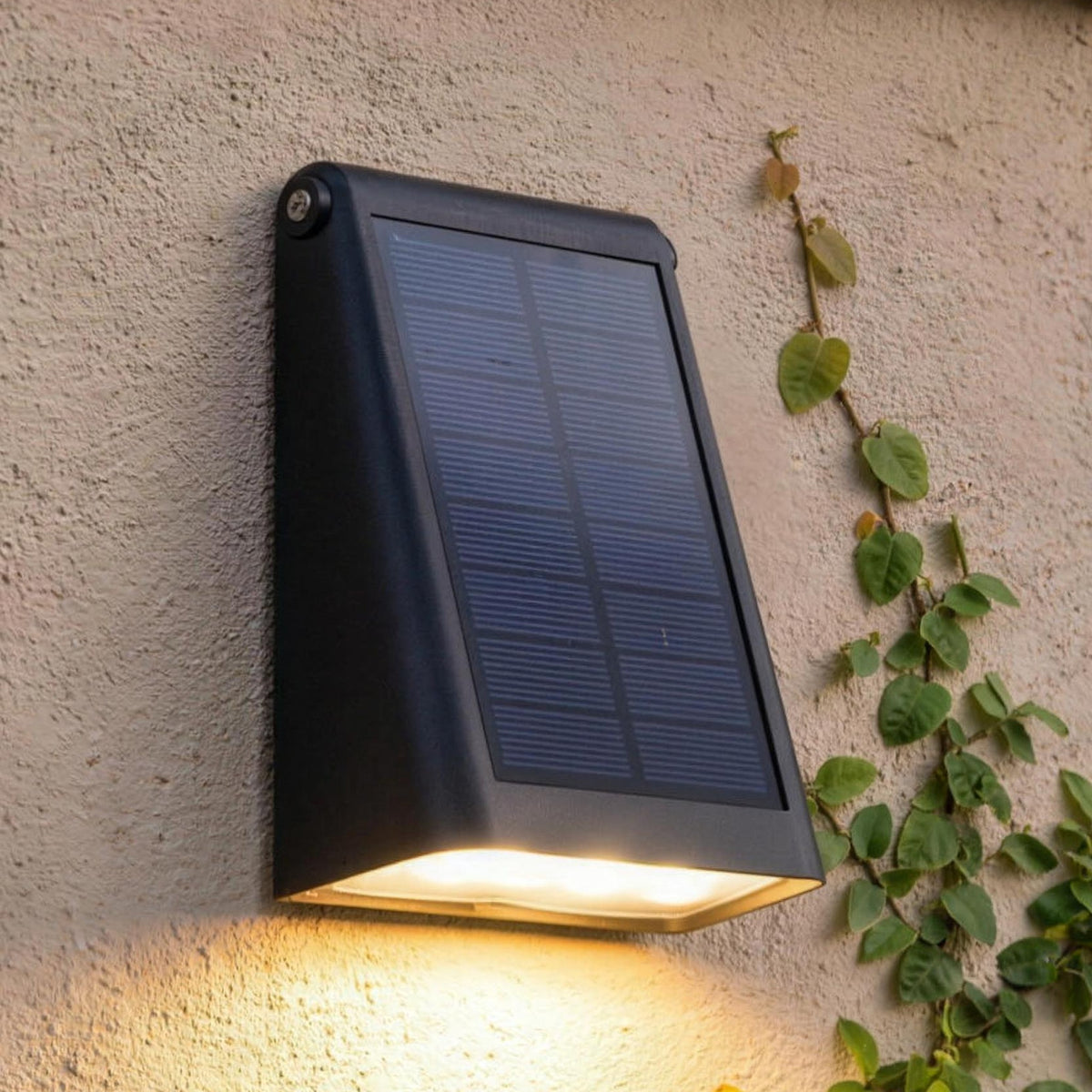 Solar wall light, Small Wedge, glowing down a garden pillar