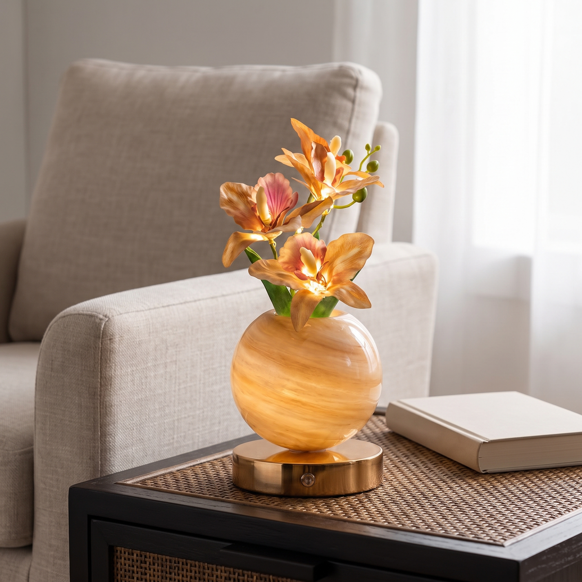 Solna orchid table lamp in Champagne beside a linen armchair