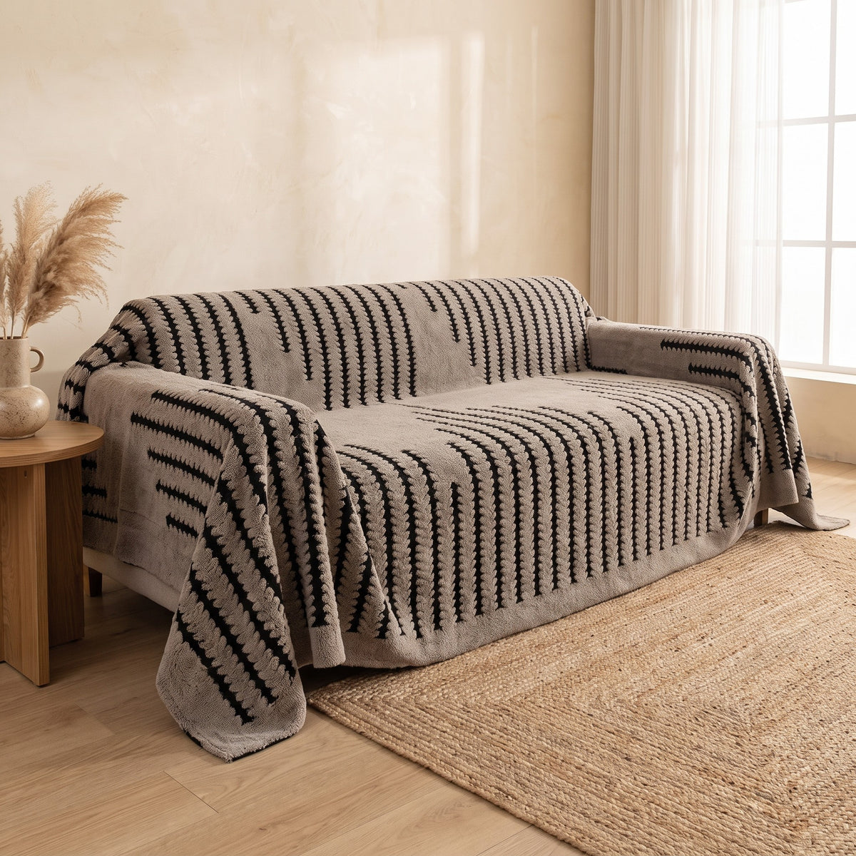 Sofa Cover in Taupe on a sofa in a living room