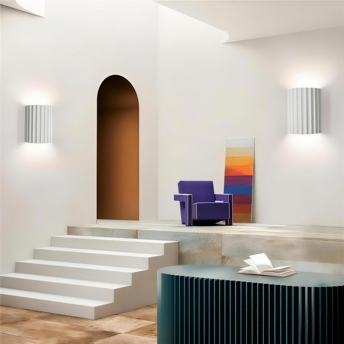 Two white Unni LED wall sconces in an entry hall
