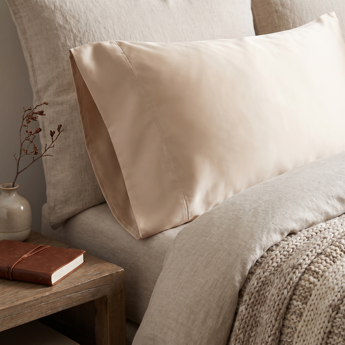 Vilde satin pillowcase showing the envelope flap closure at one end