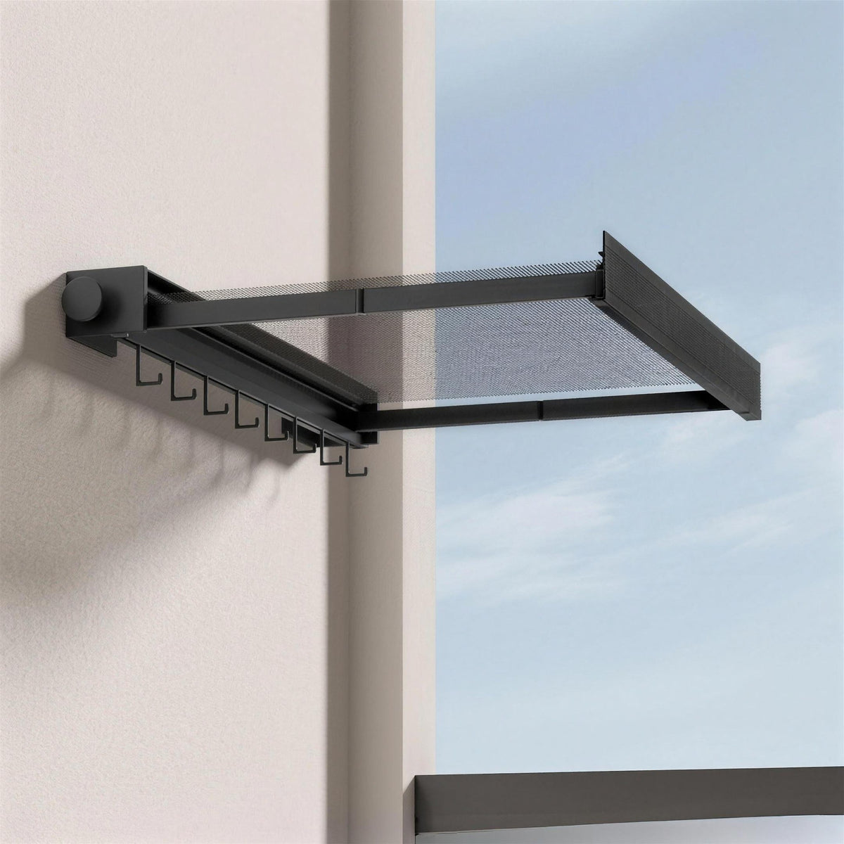 Wall drying rack in Black with the mesh shelf pulled out