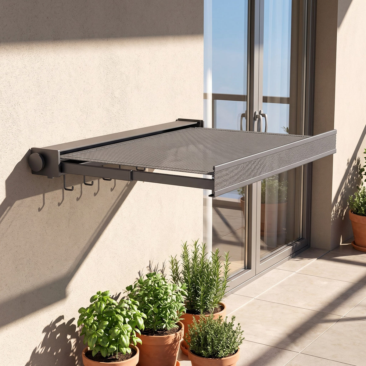 Gray wall drying rack pulled out on a sunny patio wall beside a glass door