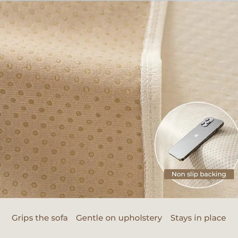 Anti slip dots on the back of the sofa cover holding a phone in place