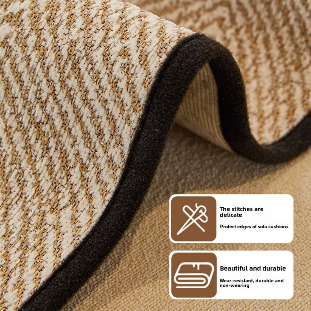 Close view of the herringbone weave and black edge with callouts on stitching and durability